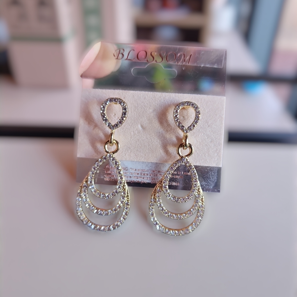 Blossom Gold-Tone Drop Earrings With Crystal Accents.